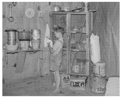 Child of Sharecropper in Missouri Kitchen May 1938