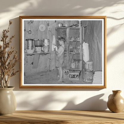 Child of Sharecropper in Missouri Kitchen May 1938