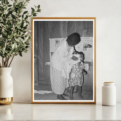 Woman Washing Daughters Face in Rural Missouri 1938