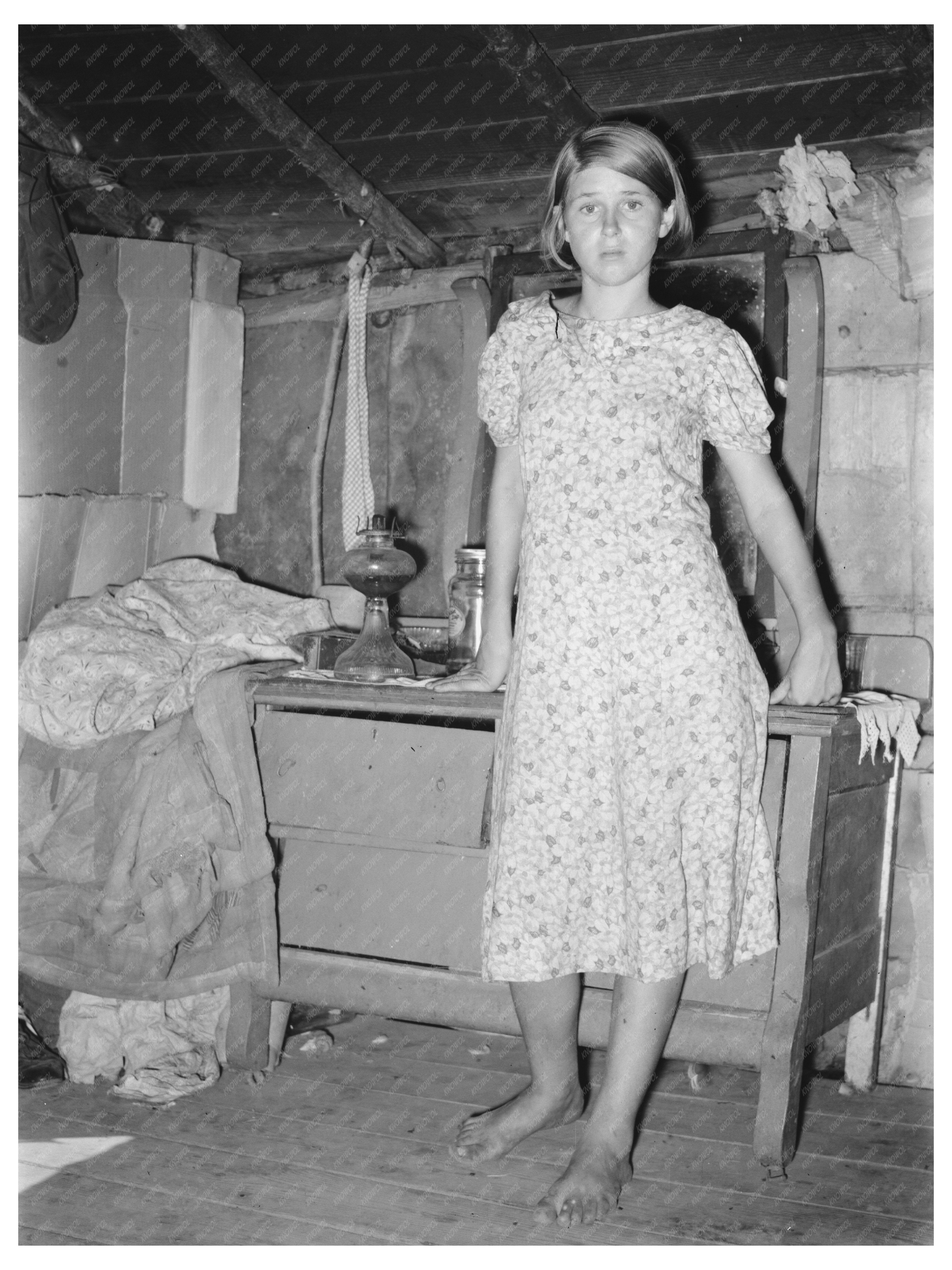 Girl at Wooden Bureau in Tin Town Missouri 1938