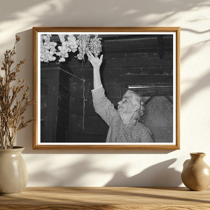 Cajun Woman Reaching for Garlic Crowley Louisiana 1938