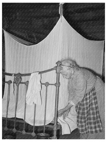 Cajun Woman Tucking Mosquito Bar Crowley Louisiana 1938