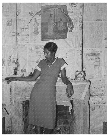 Young Girl by Fireplace in Norco Louisiana 1938