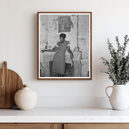 Young Girl by Fireplace in Norco Louisiana 1938
