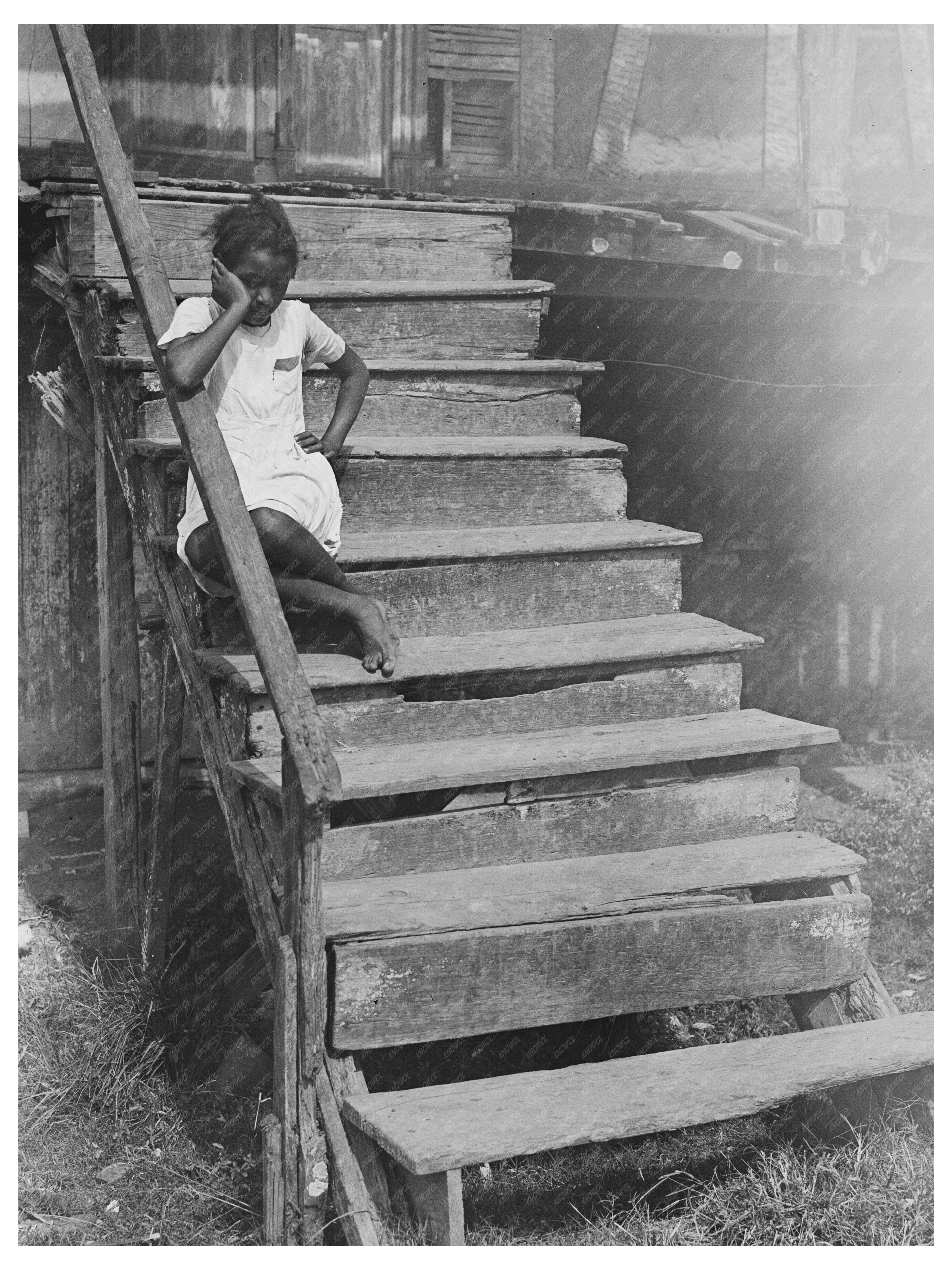 Child by Trepagnier House in Norco Louisiana 1938