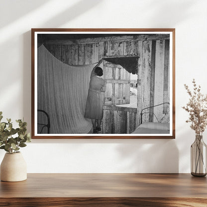 Mrs. Emil Kimball Sweeping Kitchen in Louisiana 1938