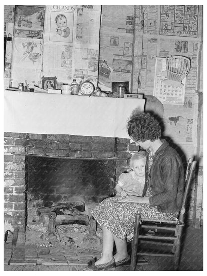 Wife and Daughter by Fireplace in Louisiana January 1939