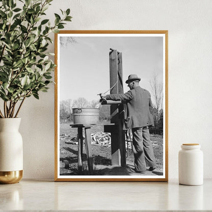 Ed Bagget Drawing Water at Well Laurel Mississippi 1939