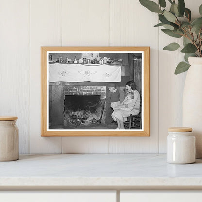 Mrs. Bagget with Children by Fireplace Laurel Mississippi 1939