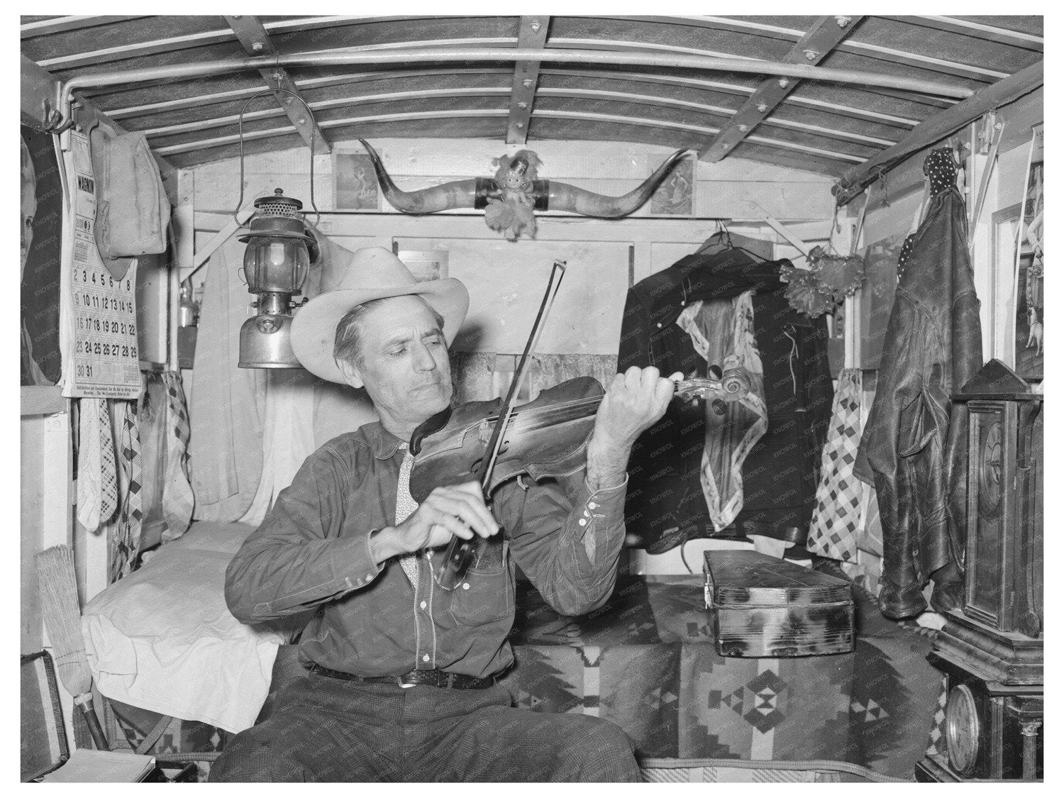 Mr. Bias Playing Fiddle in Trailer Home Texas 1939