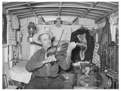 Mr. Bias Playing Fiddle in Trailer Home Texas 1939
