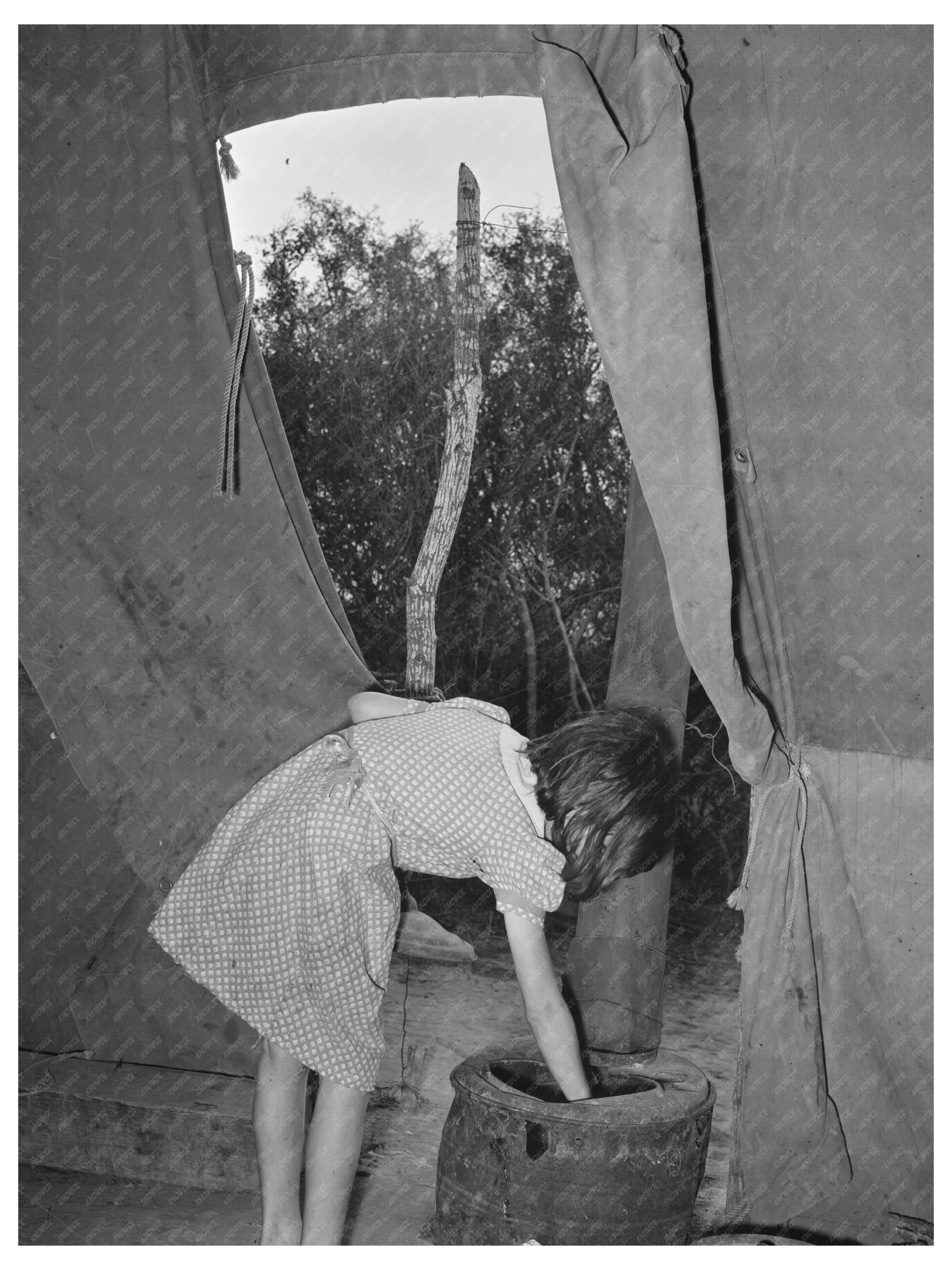 Child Builds Fire in Tent Home Harlingen Texas February 1939