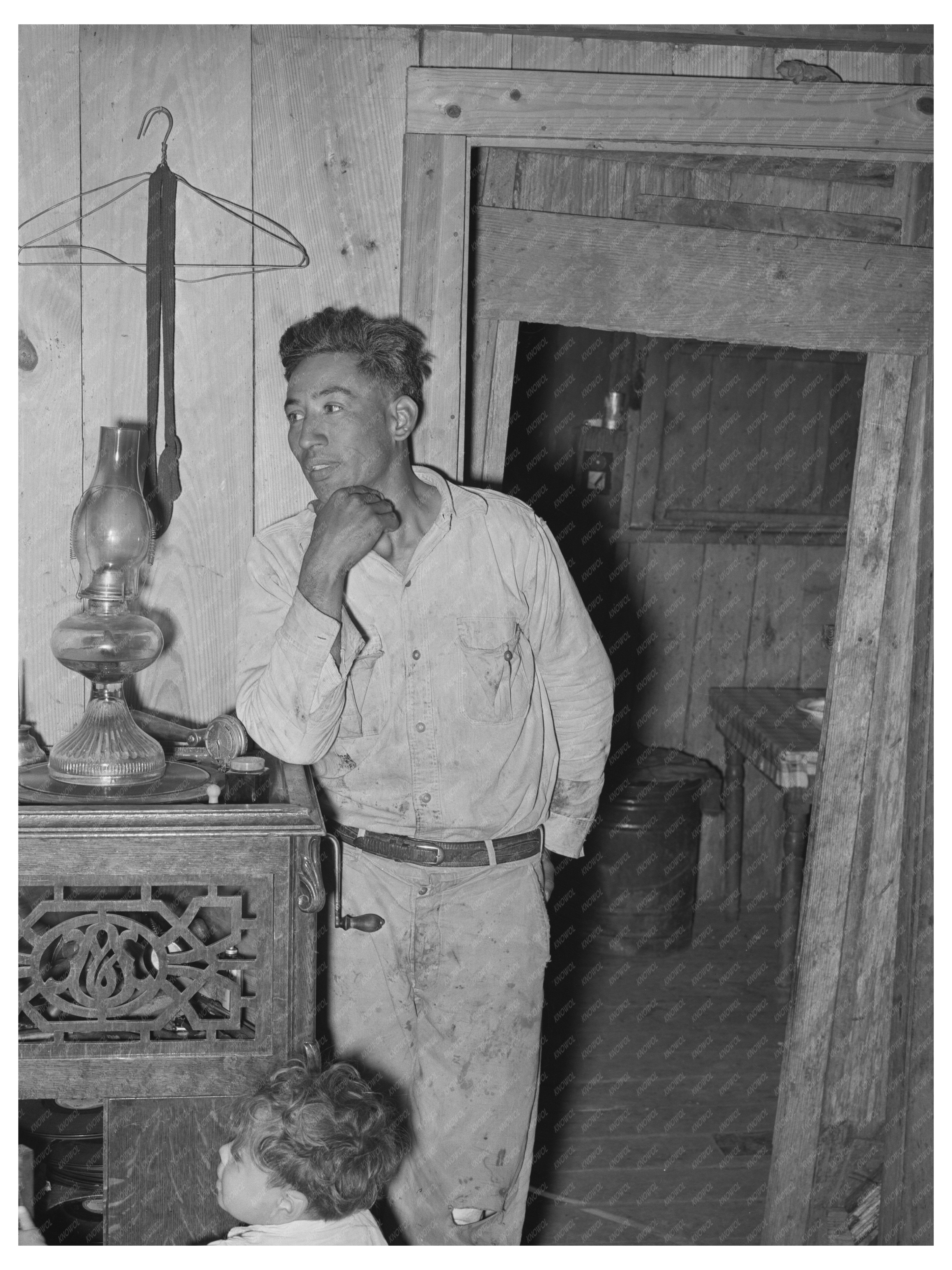 Mexican Labor Contractor and Child in 1939 Texas Home