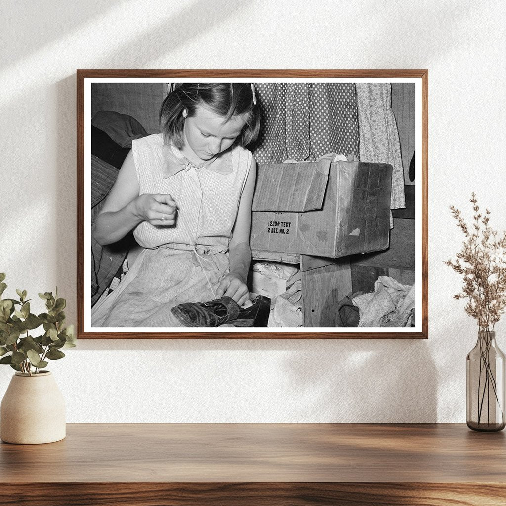Migrant Girl Repairing Shoes in Sebastian Texas 1939