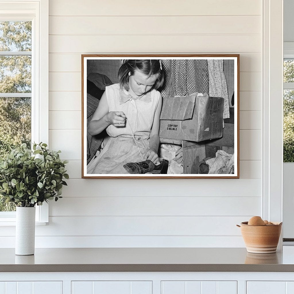 Migrant Girl Repairing Shoes in Sebastian Texas 1939