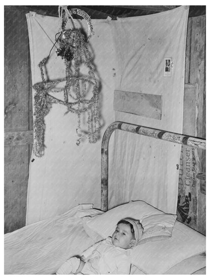Mexican Baby in Bed Crystal City Texas March 1939