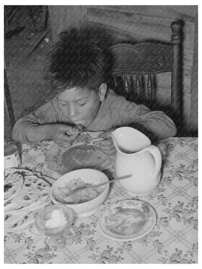 Mexican boy eating lunch in San Antonio 1939