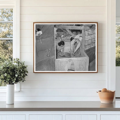 Mexican woman washing clothes in back of house. Sa