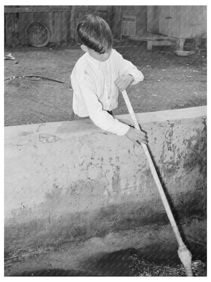 Mexican Boy Sweeping Pecan Soaking Vat San Antonio 1939