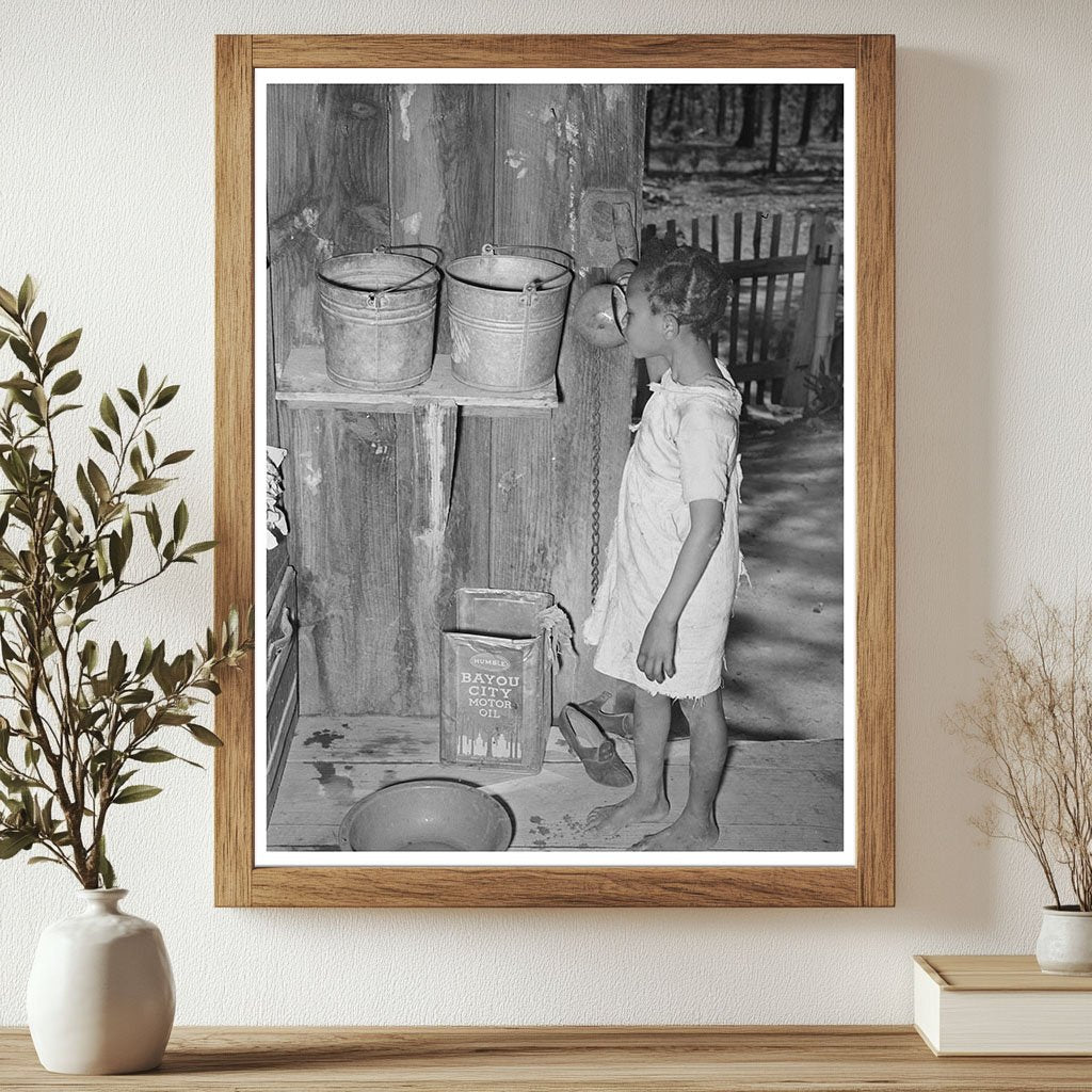 Daughter of Sharecropper Drinking from Gourd 1939