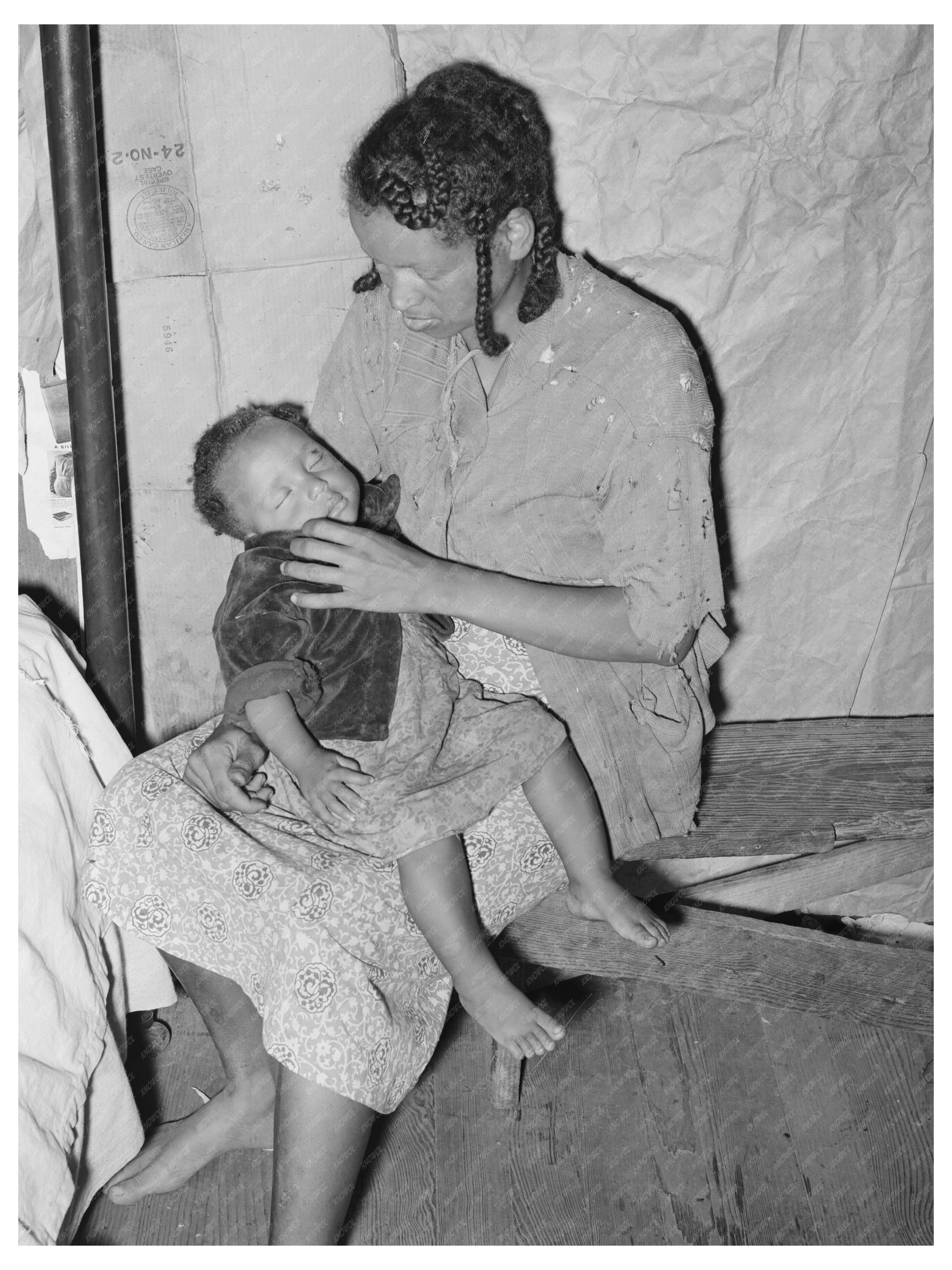 Strawberry Picker with Baby Independence Louisiana 1939