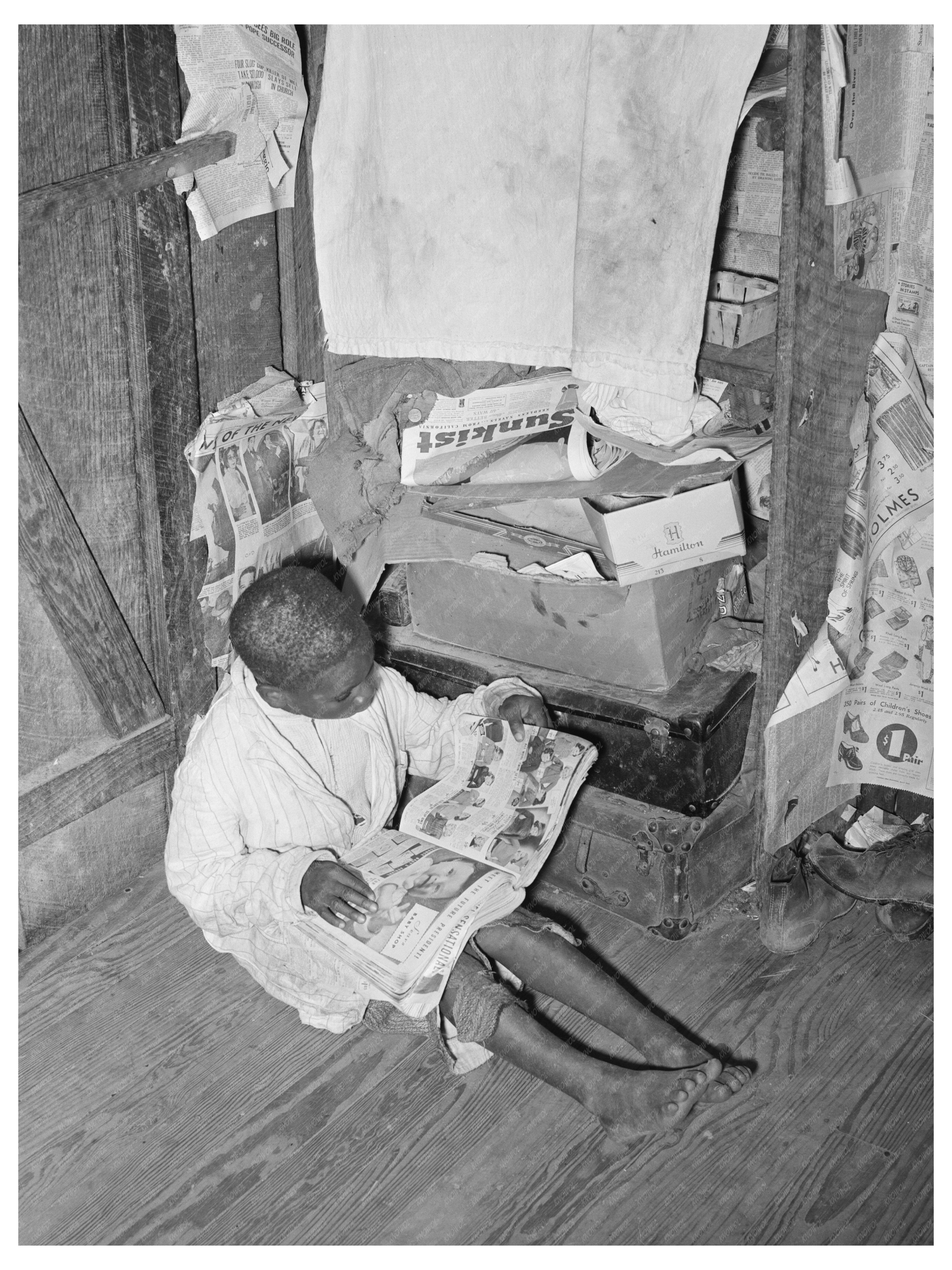 Young Boy with Mail-Order Catalog April 1939 Louisiana