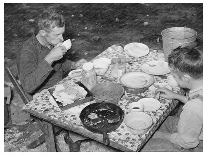 Migrant Berry Picker and Son Dinner in Louisiana 1939