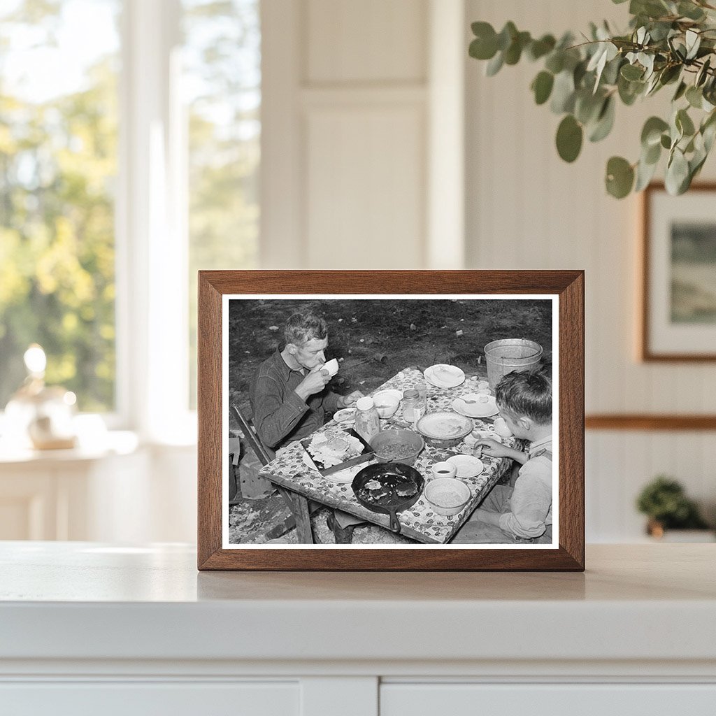 Migrant Berry Picker and Son Dinner in Louisiana 1939