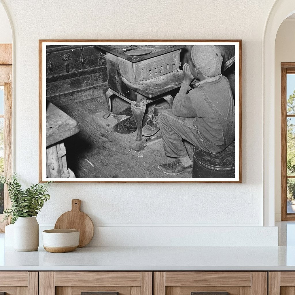 Young Boy by Stove in Strawberry Picking Season 1939