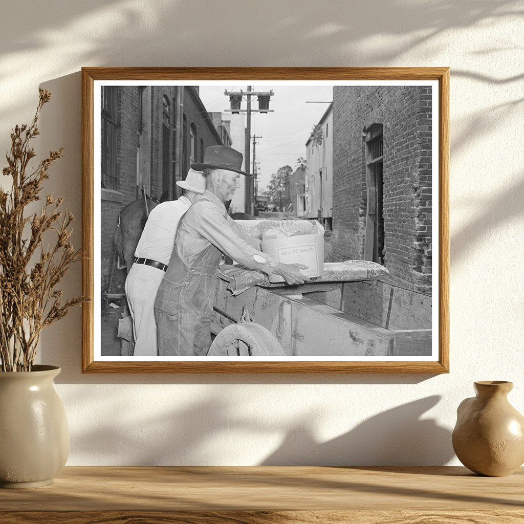 Farmer Loading Wagon in San Augustine Texas April 1939