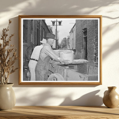 Farmer Loading Wagon in San Augustine Texas April 1939