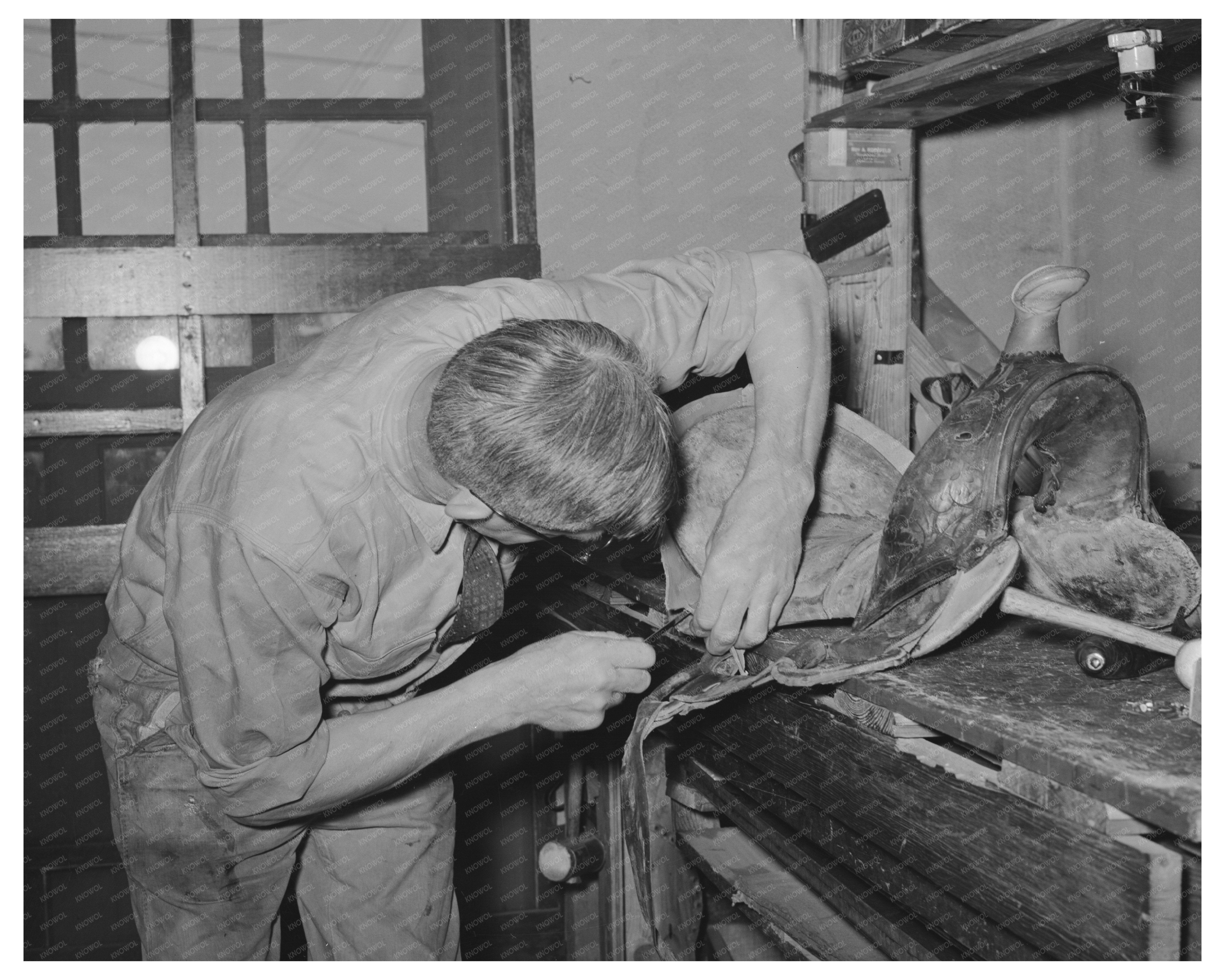 Saddle Maker Sewing in Alpine Texas May 1939