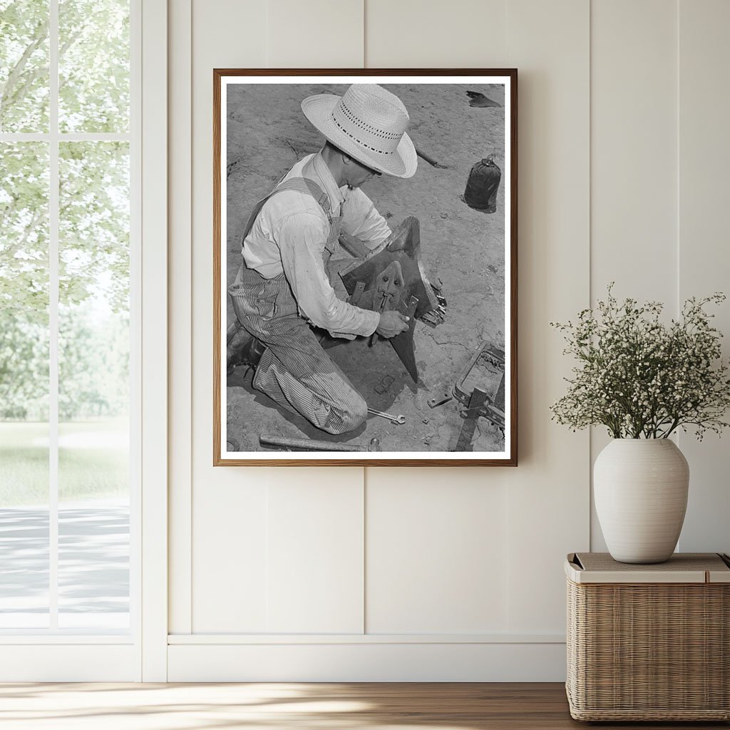 Laborer Adjusting Plow Point on Tractor Texas 1939