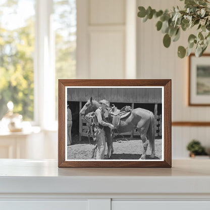 Vintage 1939 Worker Tightening Saddle at SMS Ranch Texas