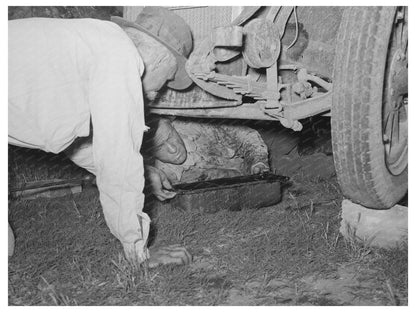 Migrant Steeple-Jack Working on Auto Near Prague 1939