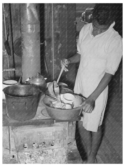 Daughter of Agricultural Laborer Washing Dishes 1939