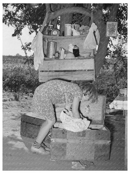 Migrant Child Packing Trunk in Muskogee Oklahoma 1939