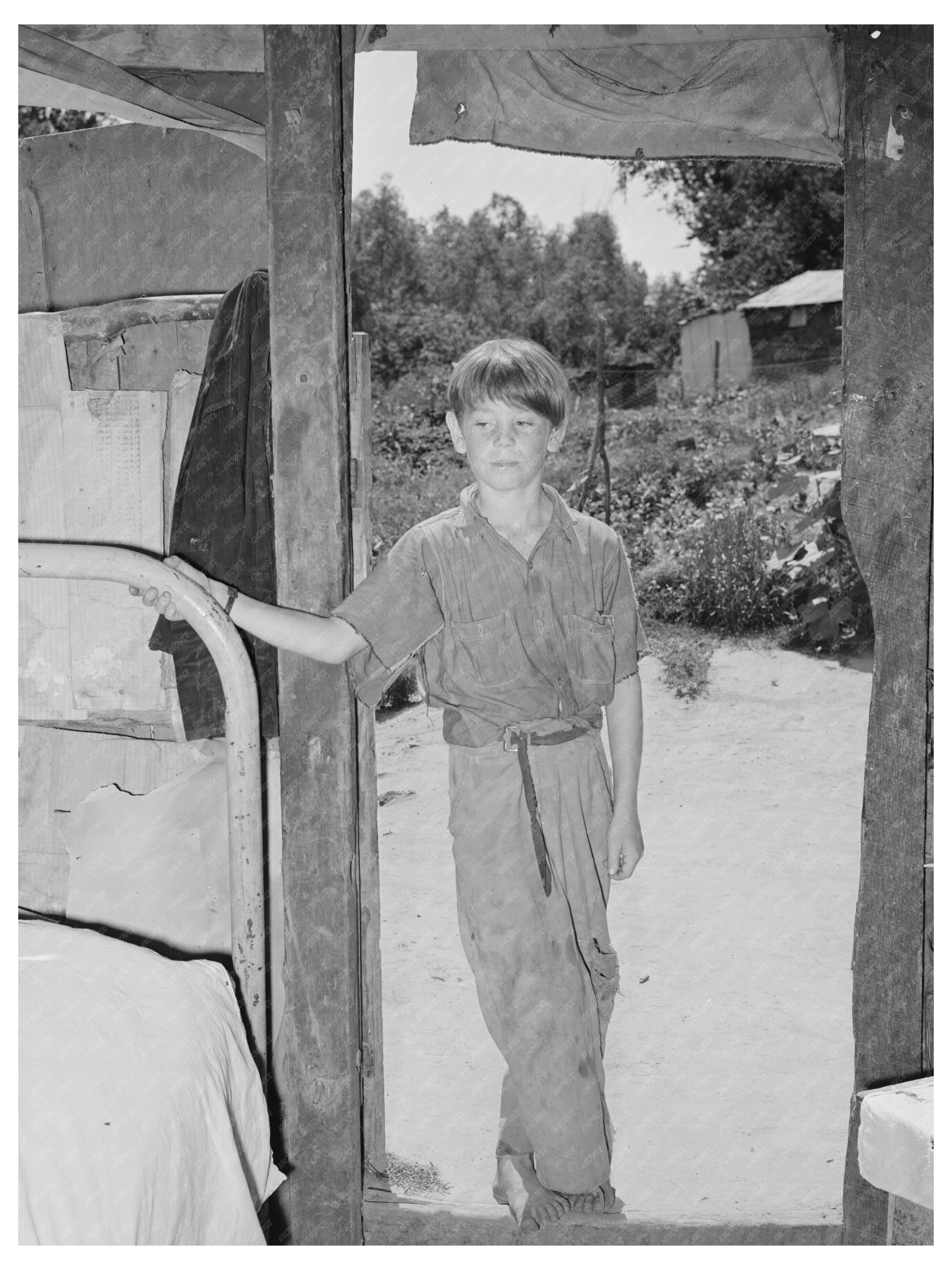 Young Boy in Doorway of Camp Home Oklahoma June 1939