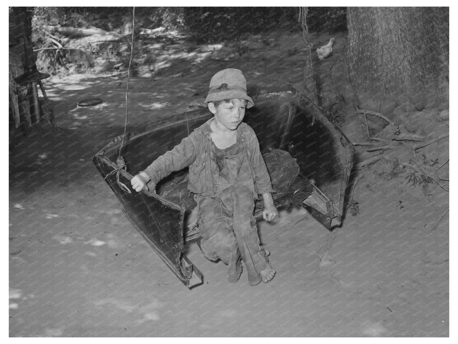 Boy Swinging with Father at WPA in Oklahoma June 1939