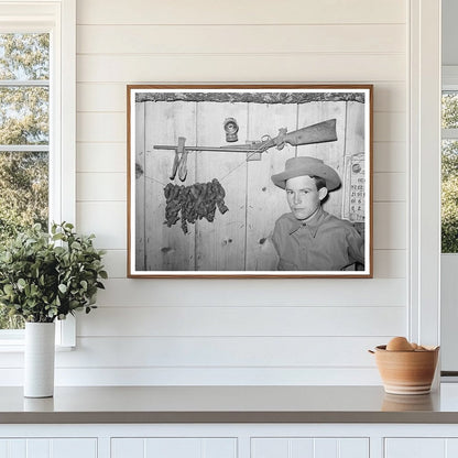 Son of Laborer with Rifle and Tobacco June 1939