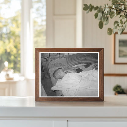 Boy Asleep in Arkansas River Bottom June 1939