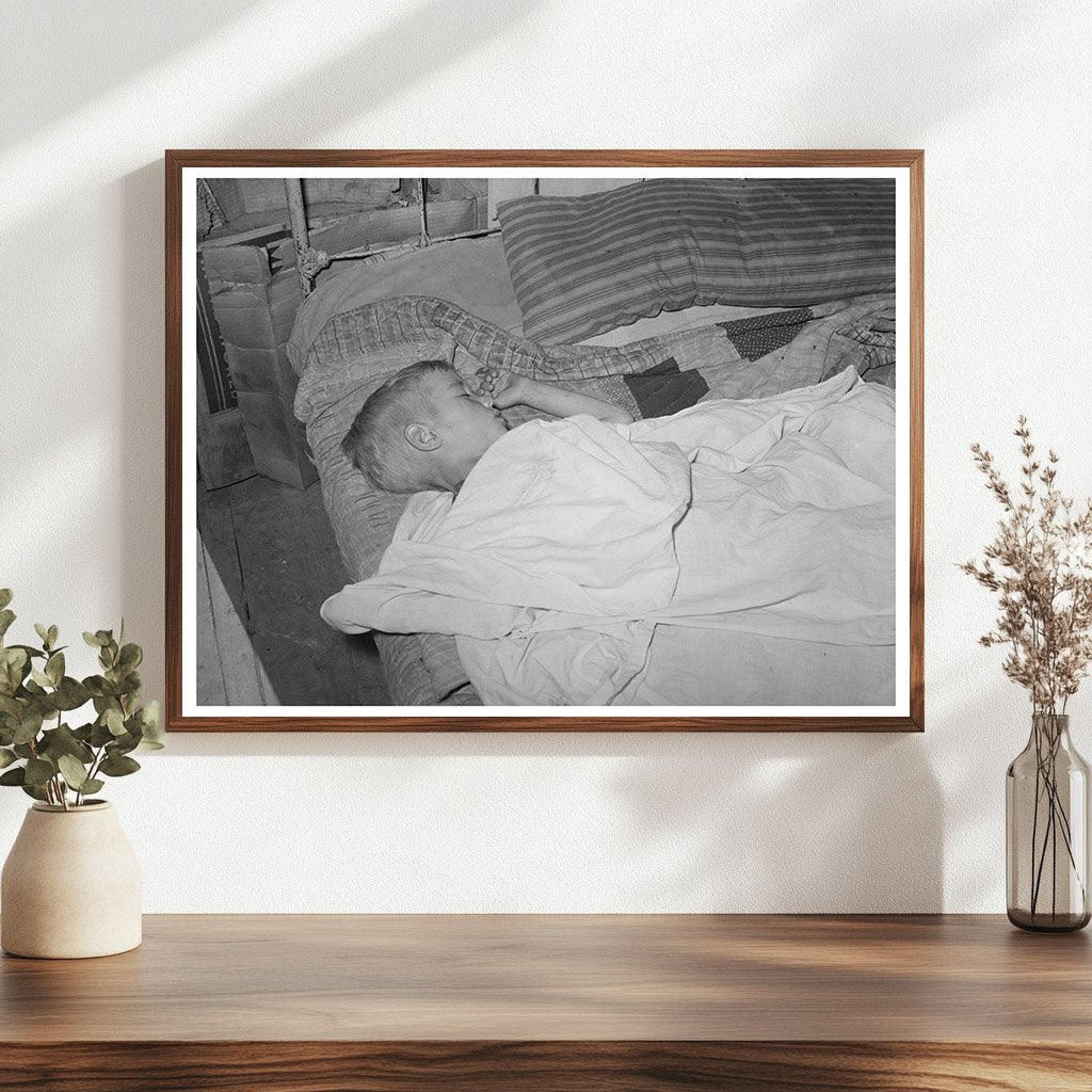 Boy Asleep in Arkansas River Bottom June 1939