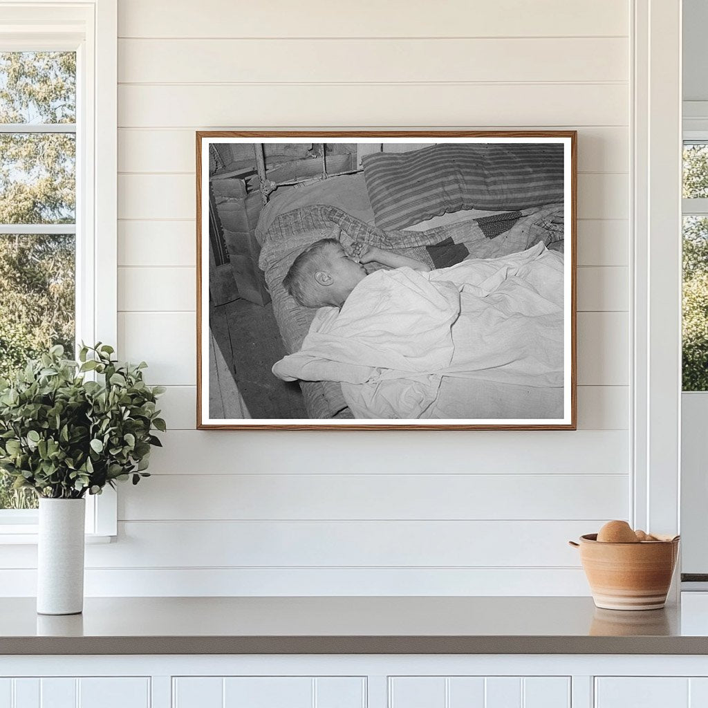 Boy Asleep in Arkansas River Bottom June 1939