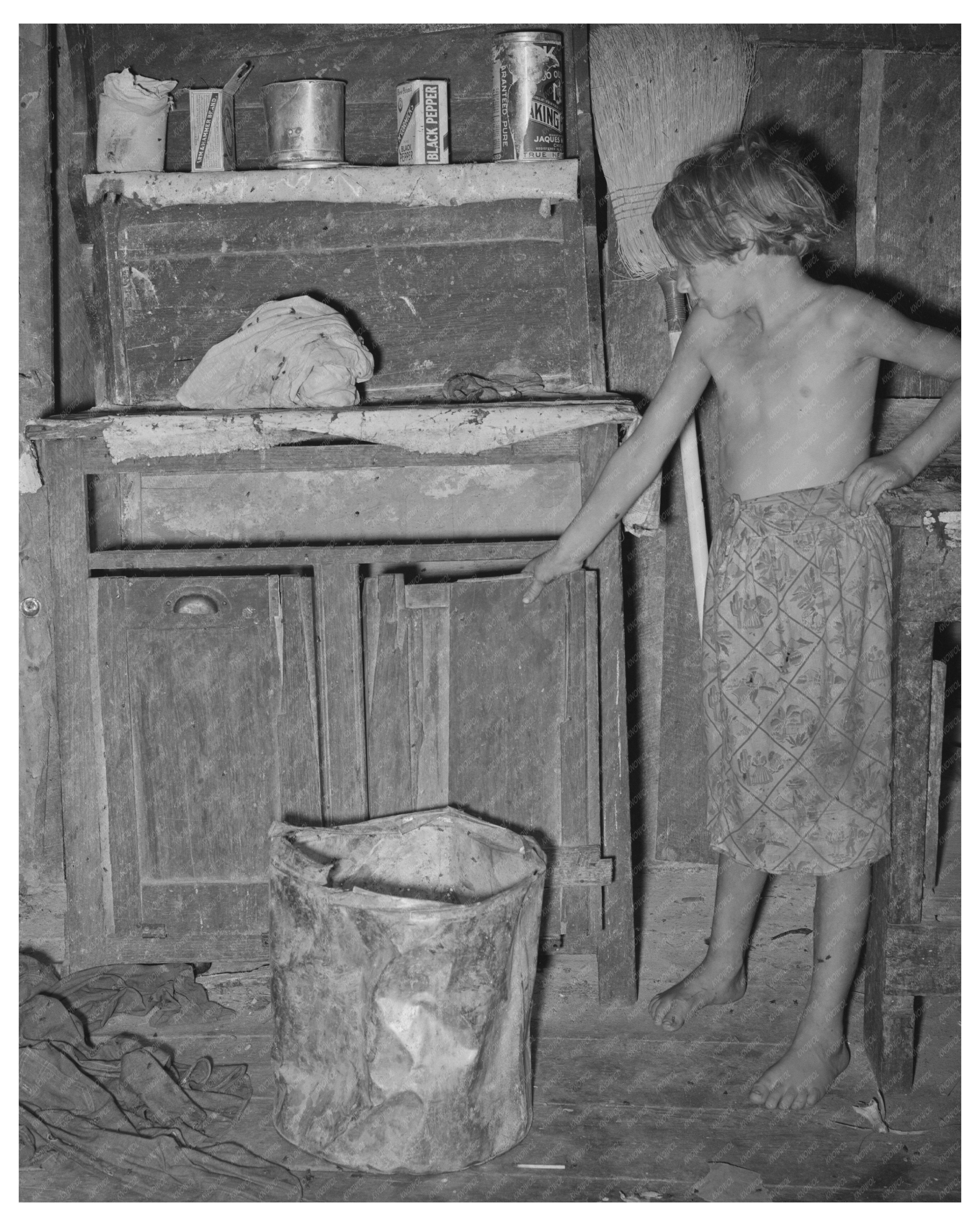 1939 Vintage Image of Girl in Oklahoma Kitchen Cabinet
