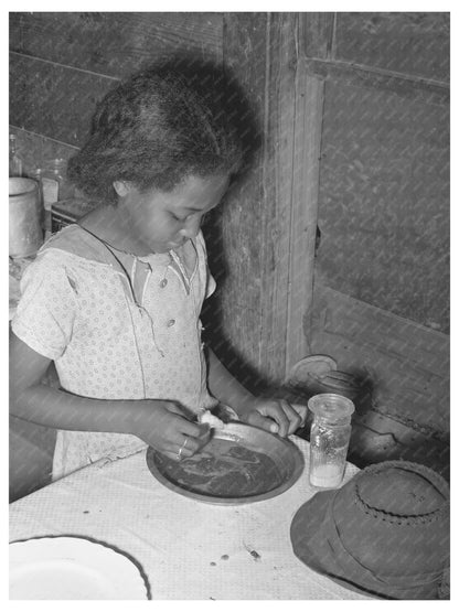 Daughter of Tenant Farmer Eating Dinner in 1939 Oklahoma