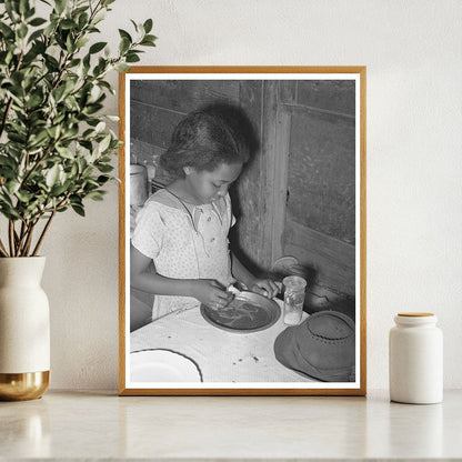 Daughter of Tenant Farmer Eating Dinner in 1939 Oklahoma