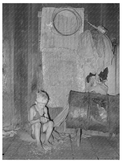 Young Boy Examines Cotton Seeds Muskogee County 1939