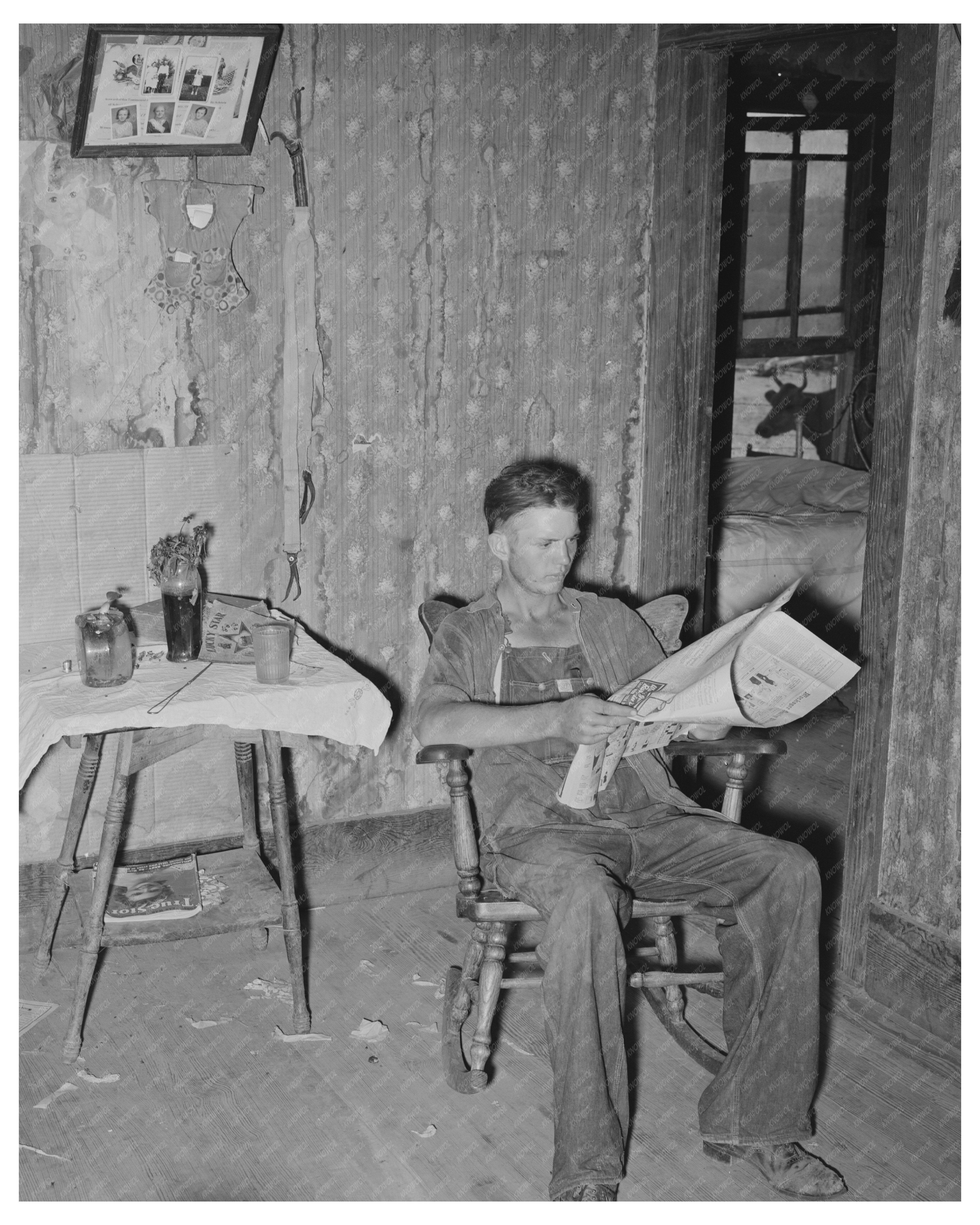 Tenant Farmers Son Reading Newspaper July 1939
