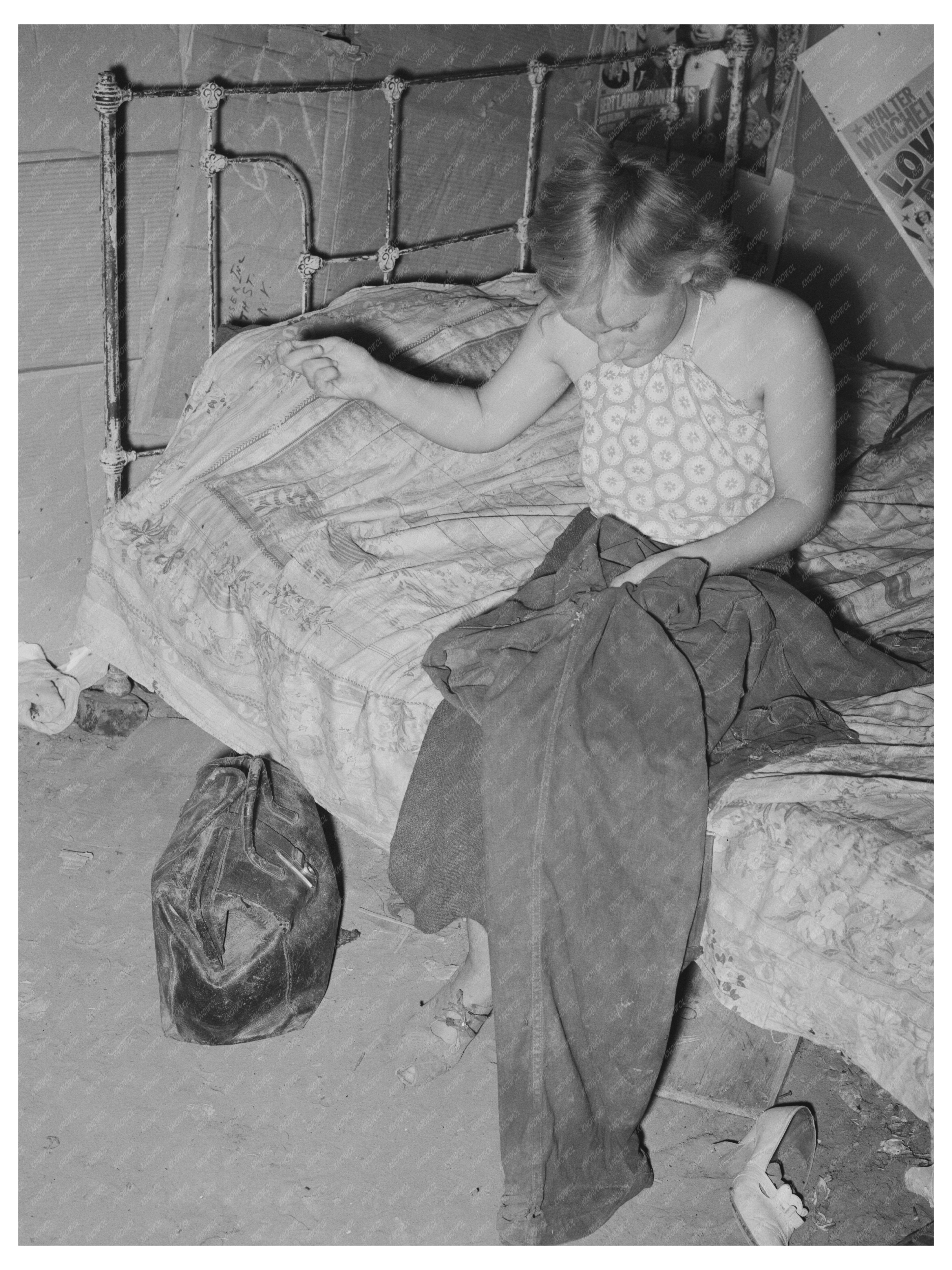 Young Woman Mending Overalls in Oklahoma City 1939