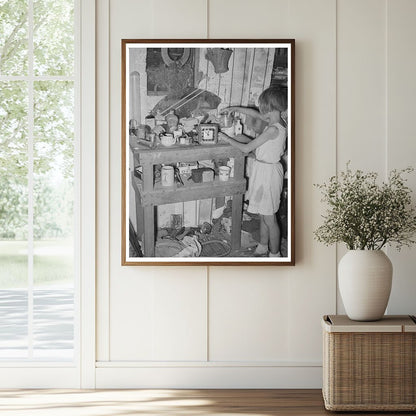 Child at Cluttered Table in Mays Avenue Camp 1939